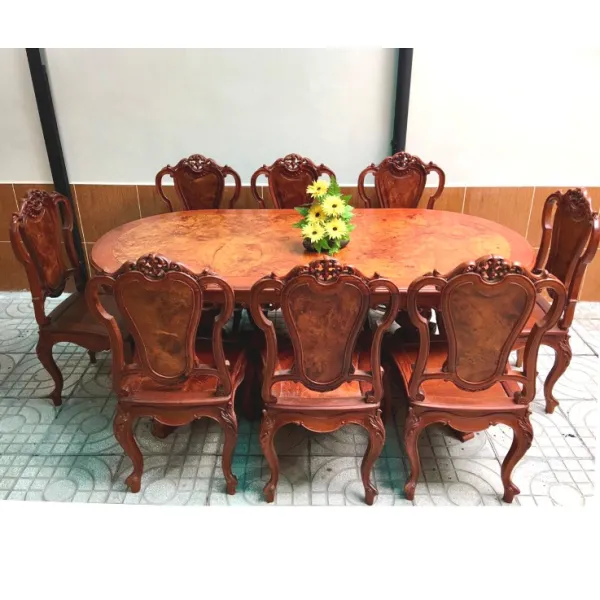 Bàn ovan 2 trụ cổ điển 8 ghế gỗ hương mặt nu hương diềm chạm mẫu  Alexander